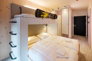เตียงในห้องที่ Oberstdorf Hostel