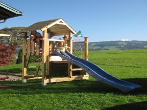 a group of people playing on a playground at Ferienhof Nigg in Rettenberg