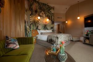 Uma cama ou camas num quarto em Wineport Lodge