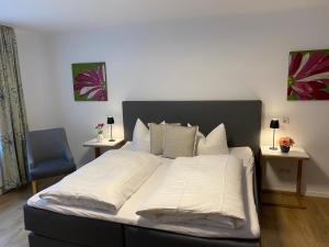 Postel nebo postele na pokoji v ubytování Hotel Ostermann
