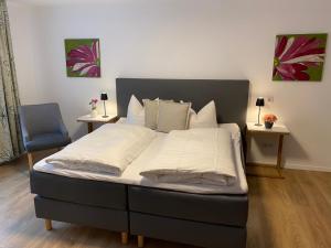 Postel nebo postele na pokoji v ubytování Hotel Ostermann