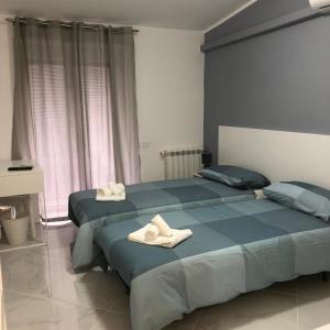 A bed or beds in a room at VILLA LUDO a ZAMBRONE TROPEA
