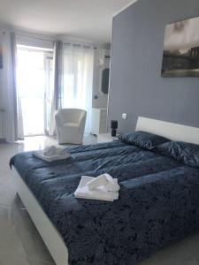 A bed or beds in a room at VILLA LUDO a ZAMBRONE TROPEA