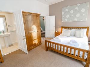 Ένα ή περισσότερα κρεβάτια σε δωμάτιο στο The Townhouse