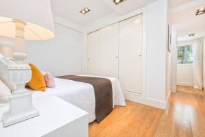 Posteľ alebo postele v izbe v ubytovaní iloftmalaga Deluxe Calle Nueva II