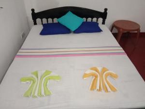 Letto o letti in una camera di Viraj's Garden