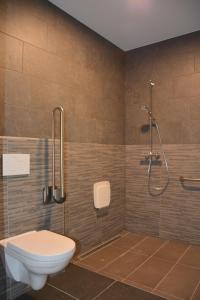 A bathroom at Duins Genot 5 star Holiday Homes 30p & 40p - Indoorpool & Wellness