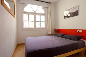 Postel nebo postele na pokoji v ubytování La Casa de Laura Nisia B&B + 8 fotografií