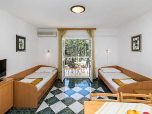 En eller flere senge i et værelse på Apartment Villa Anna-2 by Interhome + 30 billeder