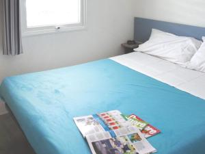 En eller flere senger på et rom på Holiday Home Balatontourist Füred-3 by Interhome