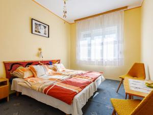 En eller flere senge i et værelse på Holiday Home Canale by Interhome