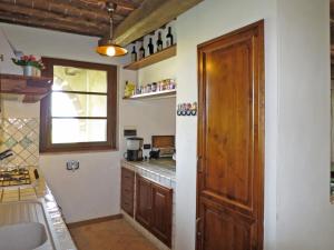 A kitchen or kitchenette at Villa Le Fonti di Santa Lucia by Interhome