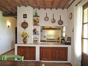 A kitchen or kitchenette at Villa Le Fonti di Santa Lucia by Interhome