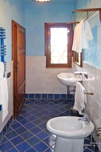 A bathroom at Villa Le Fonti di Santa Lucia by Interhome