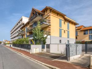 an apartment building on the side of a street at Apartment Les Amarres de l'Aiguillon-3 by Interhome in Arcachon