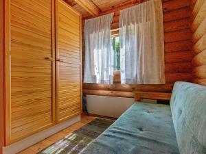Posezení v ubytování Holiday Home Heinäsorsa by Interhome