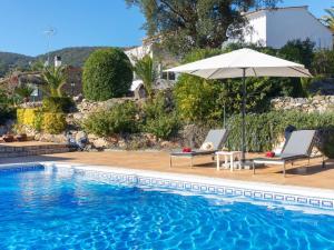 Bazén v ubytovaní Holiday Home El Suro by Interhome alebo v jeho blízkosti