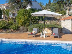 Bazén v ubytovaní Holiday Home El Suro by Interhome alebo v jeho blízkosti