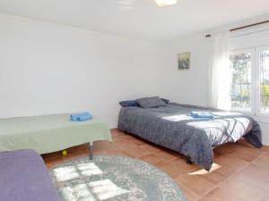 Posteľ alebo postele v izbe v ubytovaní Holiday Home El Suro by Interhome