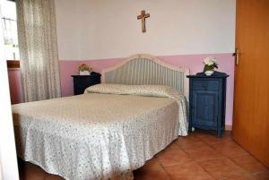 Ліжко або ліжка в номері VILLA LENA 100 mt dal mare tra Terracina e Sperlonga