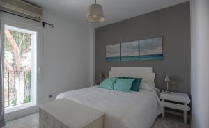 Postel nebo postele na pokoji v ubytování Casa el Jardin de Indalo - Mojacar Playa + 21 fotografií