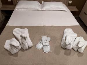 Postel nebo postele na pokoji v ubytování Elross Hotel