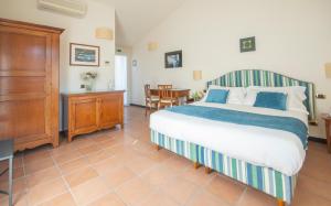 Postel nebo postele na pokoji v ubytování Hotel Al Terra Di Mare