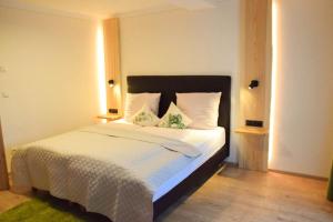 Letto o letti in una camera di Gasthof Rieder Stubn Hotel#Restaurant#Pinseria