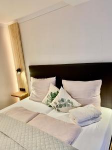 Letto o letti in una camera di Gasthof Rieder Stubn Hotel#Restaurant#Pinseria
