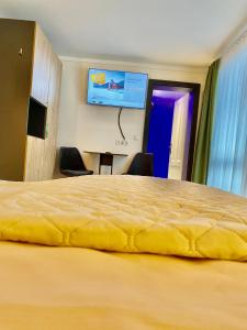 Letto o letti in una camera di Gasthof Rieder Stubn Hotel#Restaurant#Pinseria