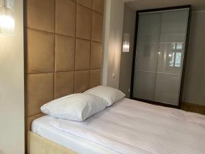 Postel nebo postele na pokoji v ubytování Apartamenty Dream of Bydgoszcz