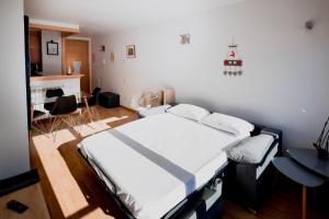 Postel nebo postele na pokoji v ubytování Apartaments Ashome