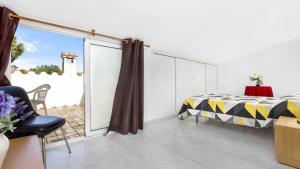 Postel nebo postele na pokoji v ubytování Atic Mar - Calella de Palafrugell