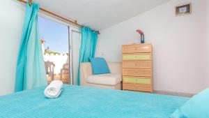 Postel nebo postele na pokoji v ubytování Atic Mar - Calella de Palafrugell
