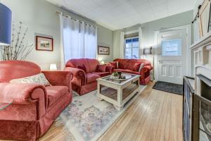 a living room with two couches and a table at HEALVEN in Barrie