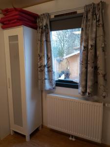 Fotografie z fotogalerie ubytování Comfortabel en gezellig familie chalet tot 6 personen op de Veluwe Bungalowpark De Kern - All inclusive v destinaci Putten