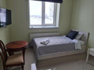 Postel nebo postele na pokoji v ubytování Grundenberga hotel with self check-in