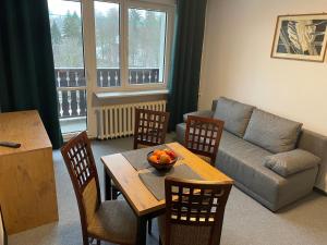 Posezení v ubytování Apartamenty Hucuł
