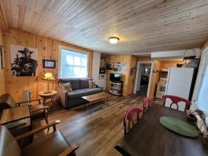 a living room with a couch and a table at Free Spirit, Walking distance to East Zion trails in Orderville