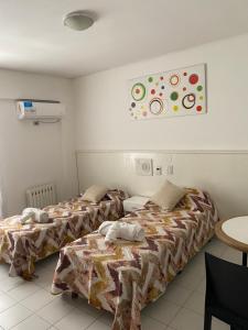 Postel nebo postele na pokoji v ubytování Portillo Apartments