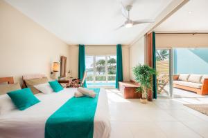 Postel nebo postele na pokoji v ubytování Suites Anagani + 37 fotografií