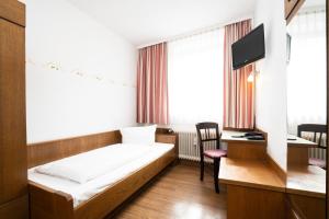TV a/nebo společenská místnost v ubytování Hotel Alt Bamberg