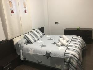 Postel nebo postele na pokoji v ubytování Vivienda con Fines Turísticos Salvador
