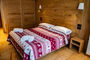 Postel nebo postele na pokoji v ubytování Hotel Dufour