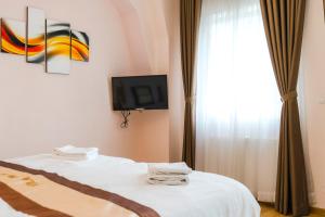 Posteľ alebo postele v izbe v ubytovaní Diana Apartments Karlovy Vary