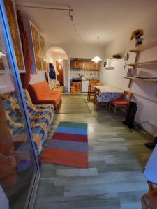 a living room with a couch and a table at San Giacomo di Roburent Cardini CN in San Giacomo