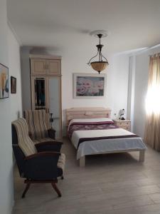 Cama o camas de una habitación en APARTAMENTO EN OLVERA CON GARAJE