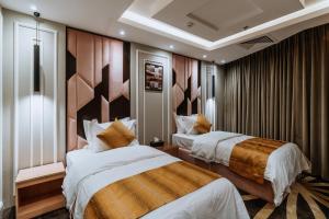 Кровать или кровати в номере Lambert Hotel