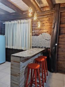 Foto da galeria de Cabana rústica a 900m da Praia da Ribanceira em Imbituba