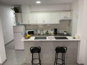 Kjøkken eller kjøkkenkrok på Vivienda Vacacional a 50 Metros de la Playa